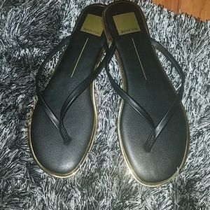 Dolce Vita Black and Gold Flip Flops